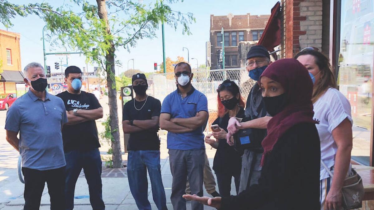 Rep. Ilhan Omar with constituents in Minneapolis,